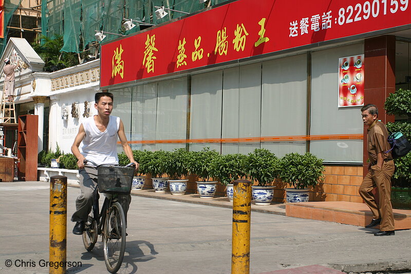 Photo of Chinese Bicycle Commuter on Sidewalk(4217)