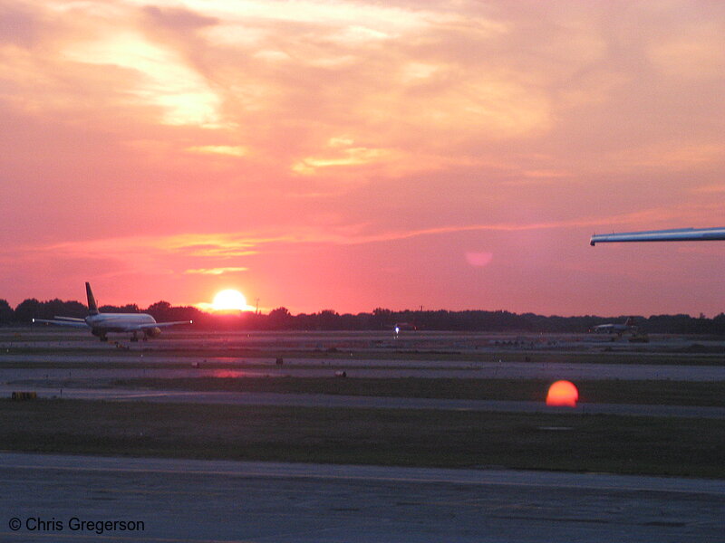 Photo of Plane on the Runway at Sunset(4369)