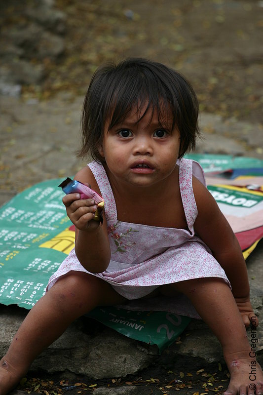 Photo of Street Child Holding Food(4427)