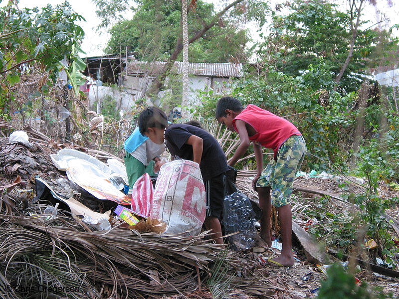 Photo of Boys Looking Through Trash, the Philippines(4614)
