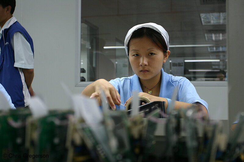 Photo of Young Woman Working in Electronics Factory(4889)