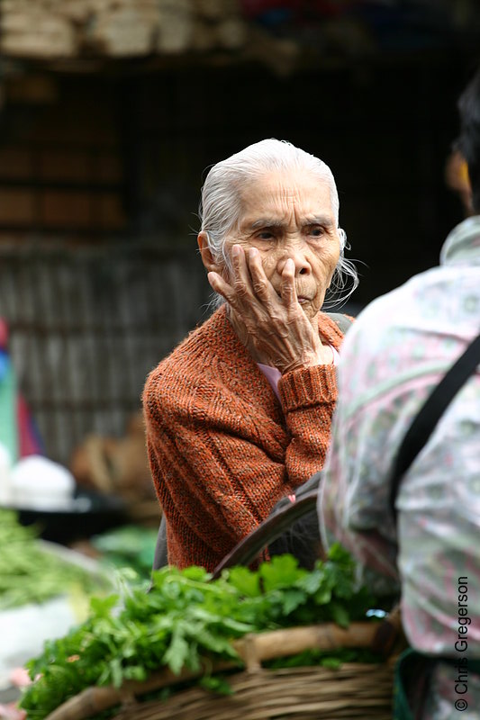 Photo of An Old Woman Resting Her Head on Hands in the Baguio Public Market(5761)