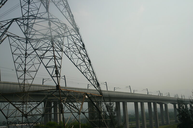 Photo of Elevated Train Tracks and a Power Line Tower in China(6155)