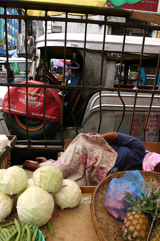 Photo of Produce Vendor Sleeps in Traffic, Manila, Philippines.(6293)