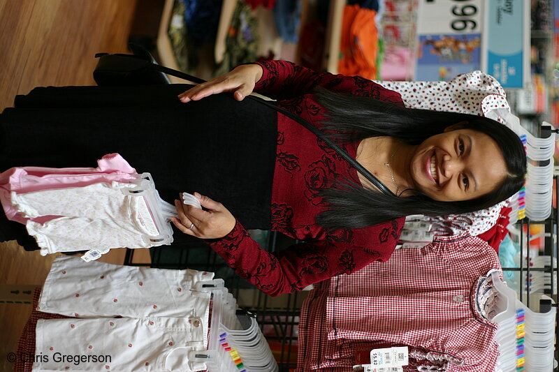 Photo of Mother-to-be Shopping for Baby Clothes(6797)