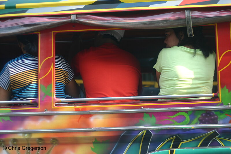 Photo of Passengers in Window of a Colorful Jeepney, Manila, Philippines(6870)