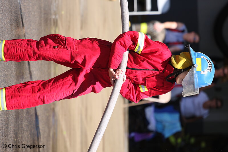 Photo of Fire Fighter Holding Water Hose(7776)